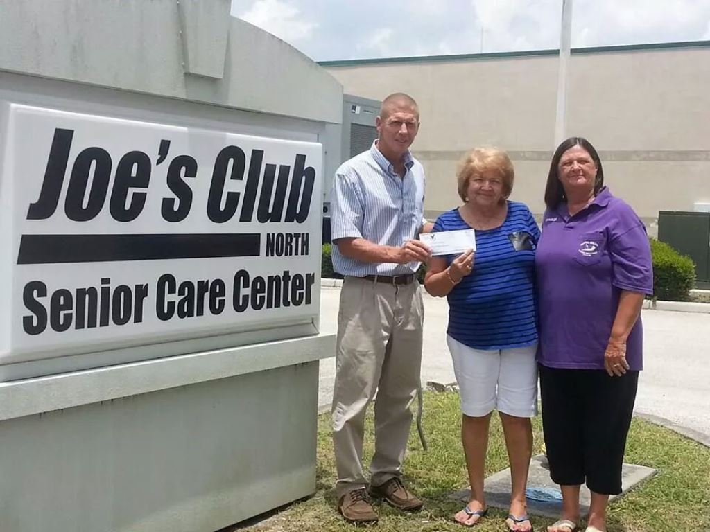08-01-2014 Nancy & Sharon behalf of Auxiliary present $1,000.00 check to Joe's Club